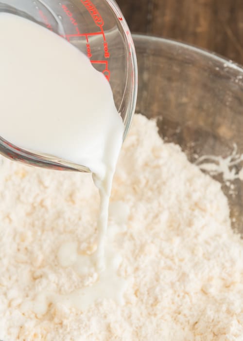 Add the milk to the flour mixture.
