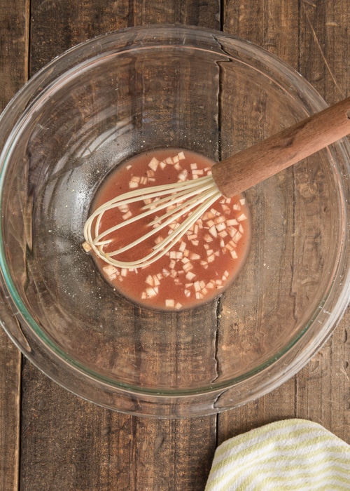 Mixing the ingredients for the dressing.