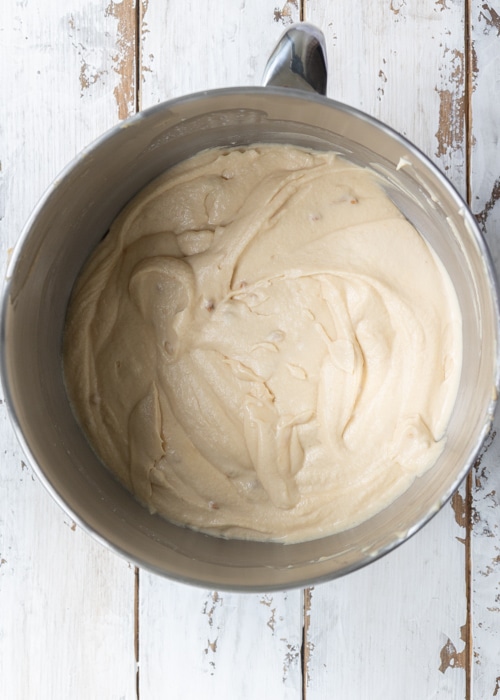 Adding the cream and sweetened condensed milk.