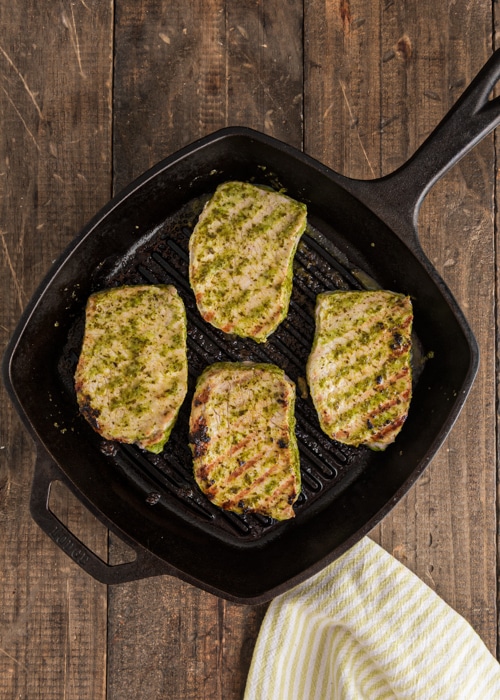 Grilling the pork chops in the pan.
