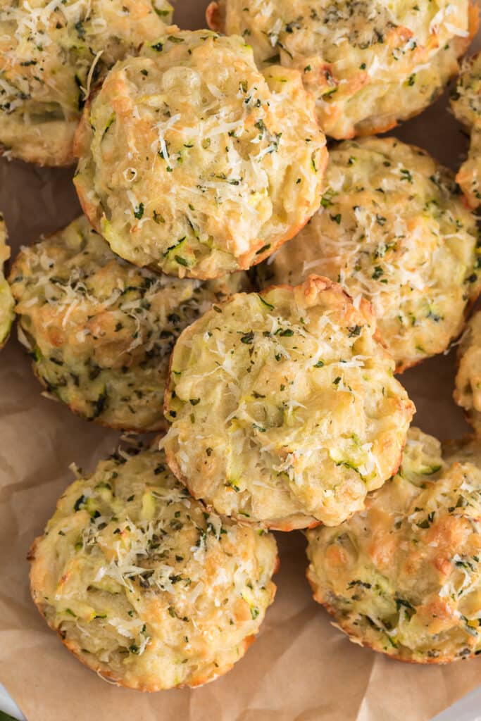 Zucchini muffins on a board.