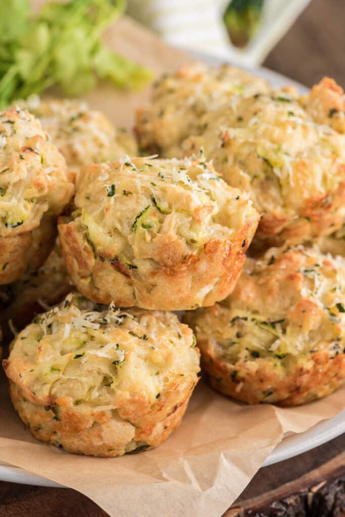 Zucchini muffins on a board.