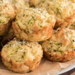 Zucchini muffins on a board.