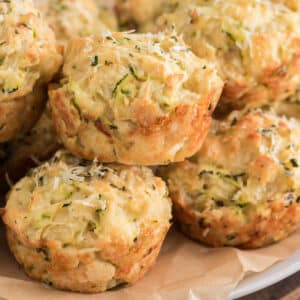 Zucchini muffins on a board.