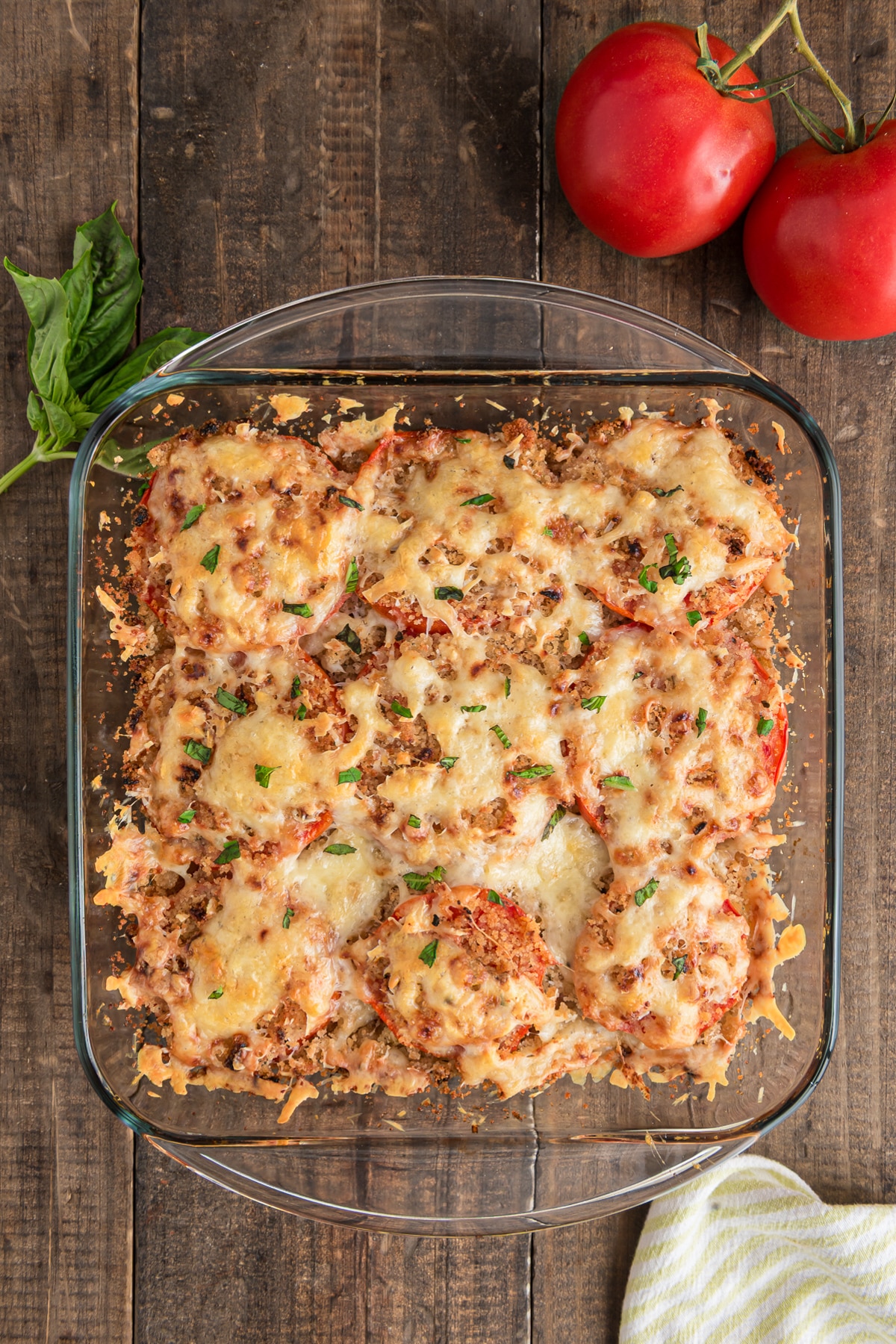 Tomato casserole in a glass pan.