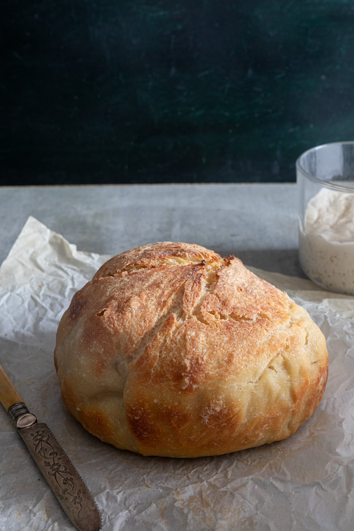 The bread on parchment paper.