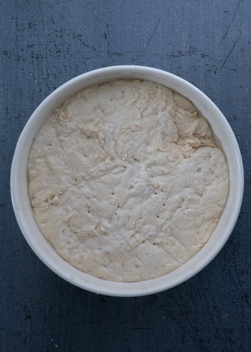 The dough risen in the bowl.