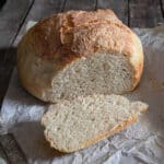 The bread with a slice cut.