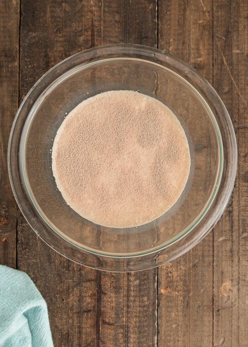 The yeast in the bowl with milk.