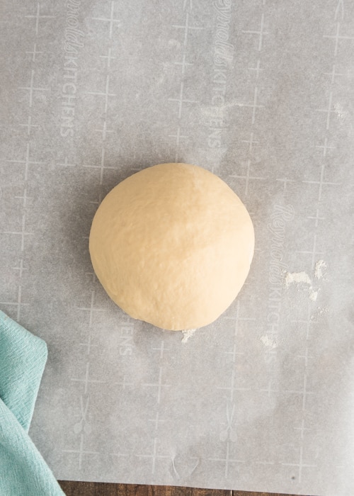The dough on the parchment paper.