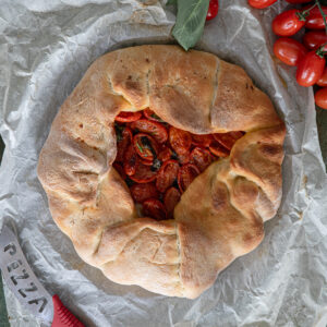 The baked mustazzedau on parchment paper.