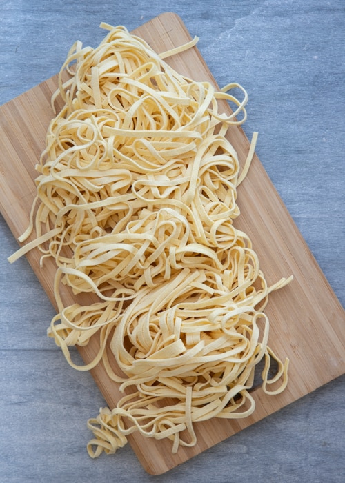 The pasta on a wooden board.