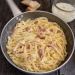 The parmesan pancetta pasta in a silver pan.