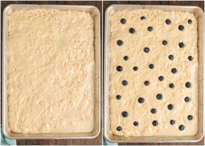 The pancake batter in the pan with and without berries.