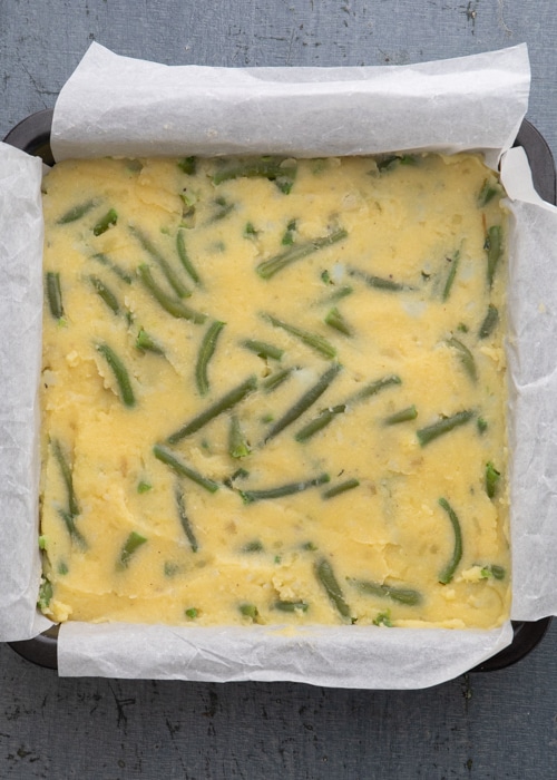 The mixture in the prepared pan.