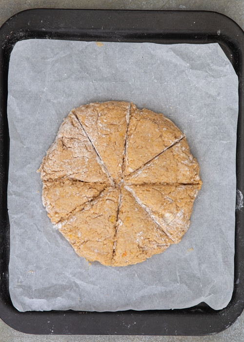 Cutting the dough into triangles.