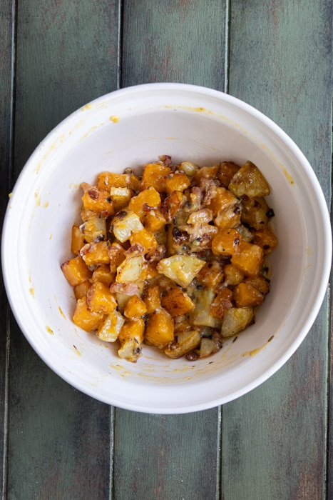 The cooked veggies and eggs in the bowl.